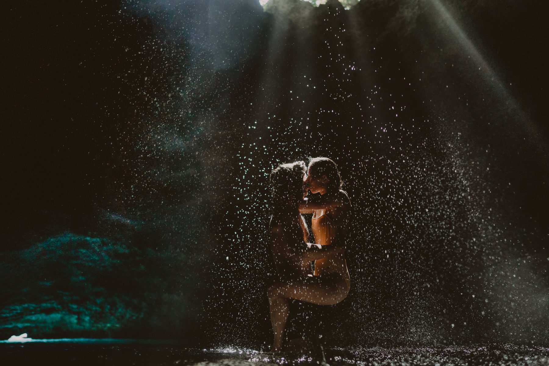 Couple hugging underwater